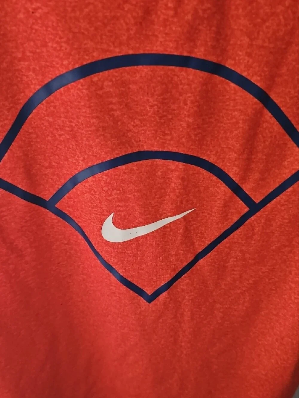 Nike Kids Orange Tee with Navy Graphic and White Swoosh